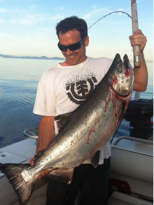 Captain Pat with a magnificent 44-pound chinook salmon