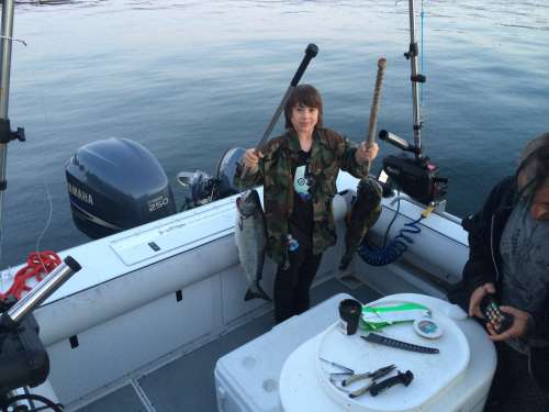 First cast of the day with Maika — and a great catch!