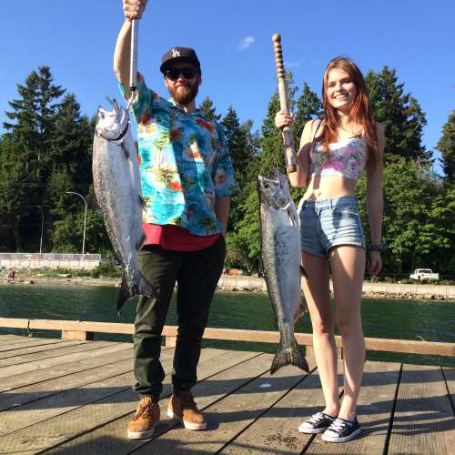 Guests enjoying a sunny day on the charter boat