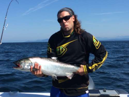 Reeling in a fish on a perfect spring morning