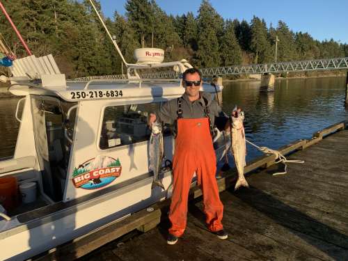 Snow-dusted mountains framing the winter waters