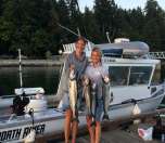 Happy ladies enjoying a fun day of fishing